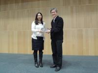 Prof. KB Wong, Dean of Students of the College, presented to Ms. Jessica Tam a souvenir.